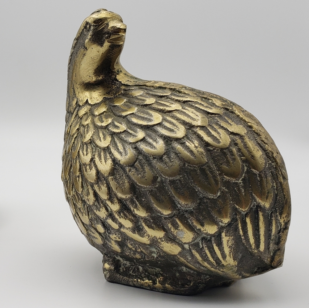 Two brass quails